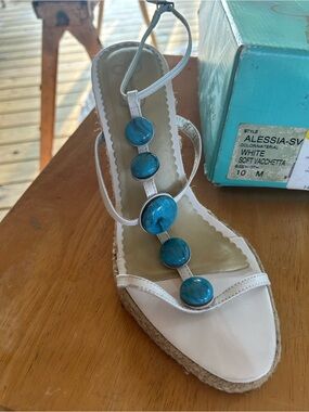 Alessi White T-Strap Sandal with Blue Gem Accents
